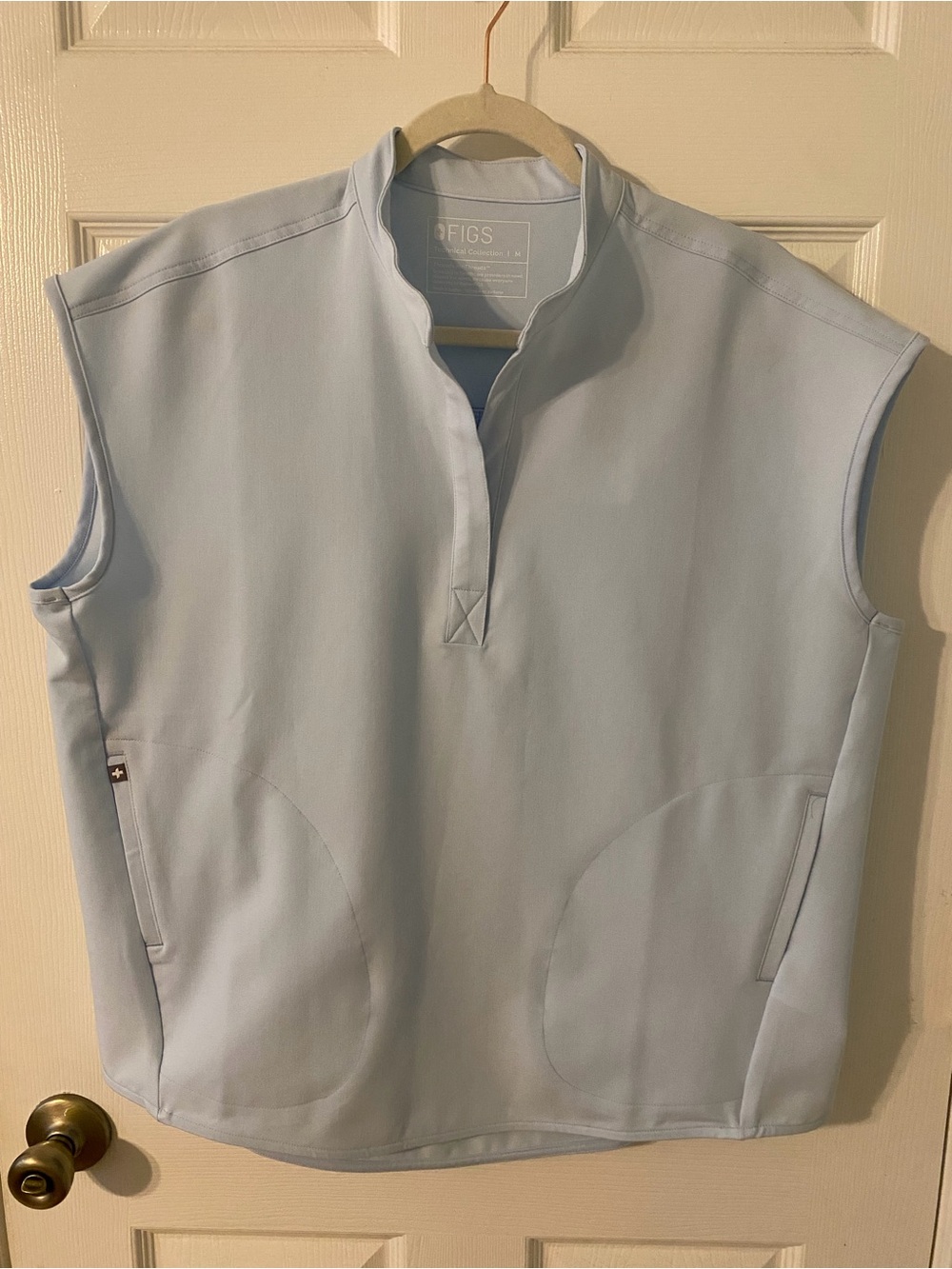 FIGS light blue top